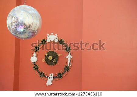 clocks on wall and lightball
