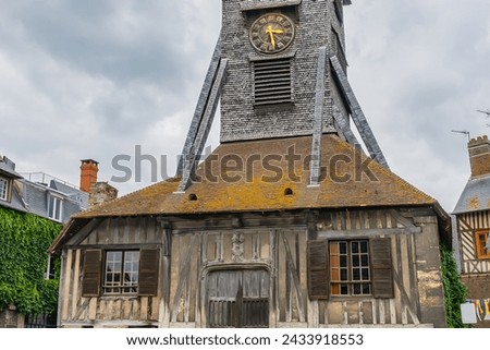 Clocktower of the Church of Saint-Catherine. Saint-Catherine is one of the oldest and largest wooden churches in France (from 15th century). Honfleur, France.