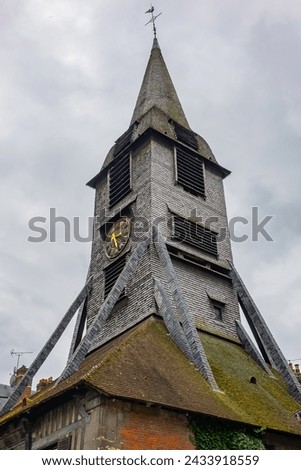 Clocktower of the Church of Saint-Catherine. Saint-Catherine is one of the oldest and largest wooden churches in France (from 15th century). Honfleur, France.