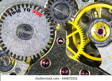 The clockwork old mechanical  high resolution with words Time to Sue