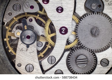 Clockwork old mechanical pocket watch. Macro shot.