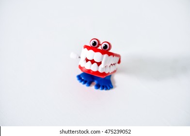 Clockwork Toy With Teeth, Eyes And Feet