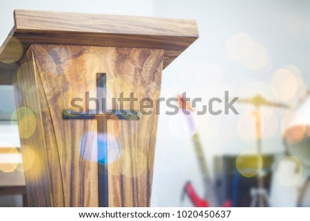 cloe up of the pulpit with Jesus cross in church service, can  be used for christian background