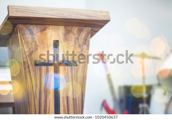cloe up of the pulpit with Jesus\
cross in church service, can  be used for christian\
background