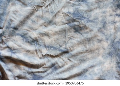 A Cloes Up Of A Old Blue Tie Dye Tee Shirt