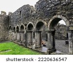 Cloister garth surrounded by the cloister arcade inside Kilconnell Abbey, a ruined medieval Franciscan friary in Kilconnell, Galway county, Connacht, Ireland