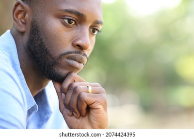 Clos Eup Portrait Of A Worried Husband With Black Skin Thinking Looking Away