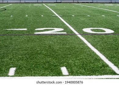 A Close Up Of The 20 Yard Line On A Artificial Turf Field 