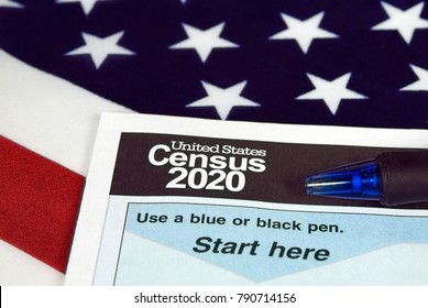 Close Up Of 2020 Census Document Form And Ballpoint Pen On American Flag