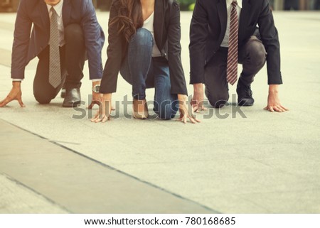 Close up of 20-30 Year Old Businessman and Women Ready to Run at Start Point. Business PEOPLE Wearing a Suit,  People Running Race. Who are Ready and Better are Winners, Business and Competition 