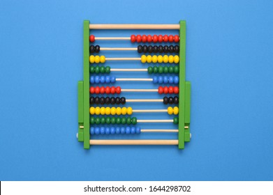 Close up of Abacus on blue background