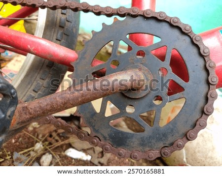Close up of an abandoned rusty bicycle chain