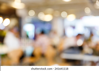 Close Up Abstract Blurred People In Food Center