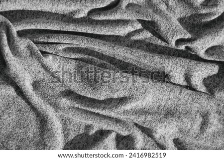 Close up abstract gray cotton heather texture background. Black and white texture knit fabric pattern