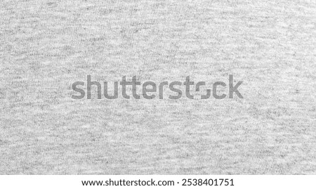 Close up abstract gray cotton texture heather background.  
Black and white texture knit fabric pattern seamless.
Selective focus.
top view.