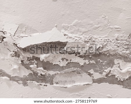 Close up abstract texture of severe damage peeling paint and plaster, bubbling, efflorescence on white wall.