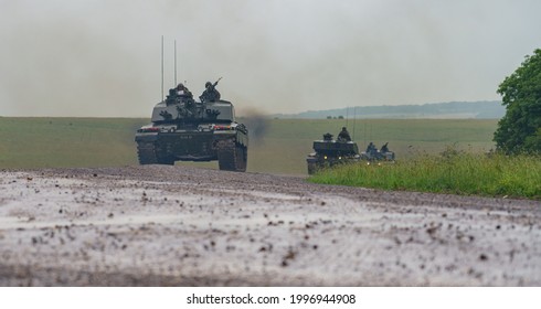 Close Up Action Shot Of A British Army Challenger 2 FV4034 Main Battle Tanks On A Military Exercise, Salisbury Plain, Wiltshire UK