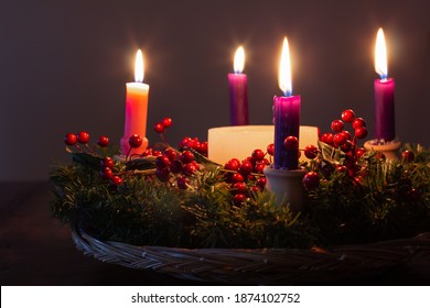 Close up Advent wreath candles lit