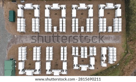 Close up aerial view of containerized BESS battery energy storage system for net zero grid power