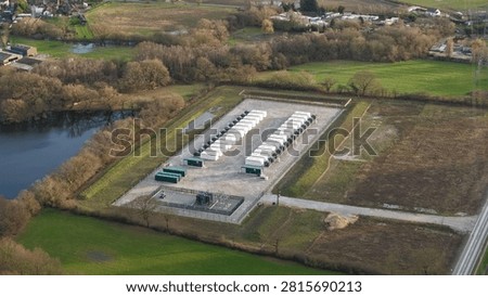 Close up aerial view of containerized BESS battery energy storage system for net zero grid power