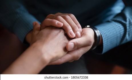 Close Up African American Man Comforting Woman, Holding Hands, Expressing Love And Support, Empathy, Apologizing Or Saying Sorry, Family Reconciliation, Understanding In Relationship