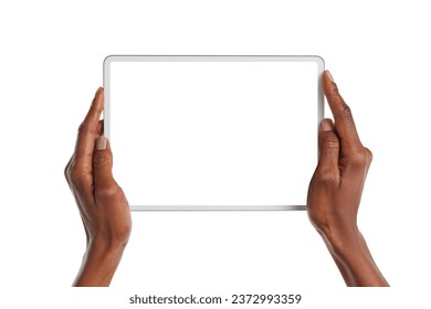 Close up of african american woman hands showing digital tablet against white background with empty screen. Black girl hands holding digital tablet with blank screen isolated. 