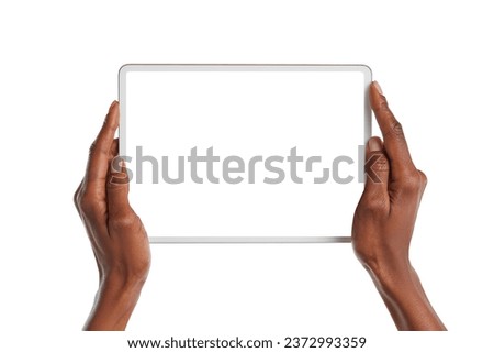 Close up of african american woman hands showing digital tablet against white background with empty screen. Black girl hands holding digital tablet with blank screen isolated. 