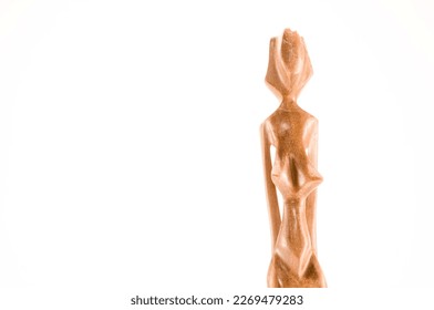 Close up of African traditional wooden Statue figurine - Shutterstock ID 2269479283