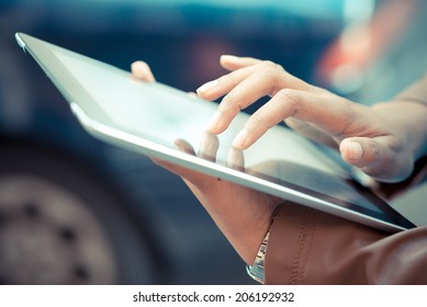 Close Up Of African Woman Hands Using Tablet