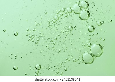 Close up air bubbles on beautiful light green background. Macro photo - Powered by Shutterstock