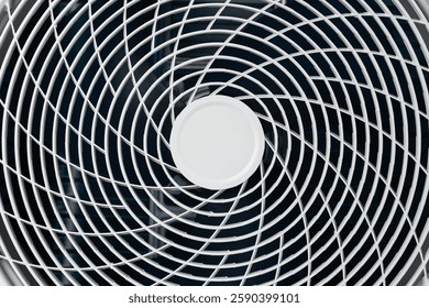 close up of air conditioner texture. Air condition cover texture. Gray protective plastic cover for air conditioner fan. Detail of industrial equipment. Close-up, abstract background, lattice pattern.