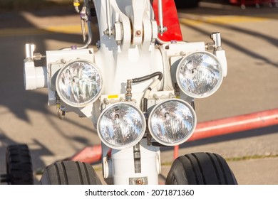 Close Up Aircraft Landing Lights On The Front Landing Gear Near