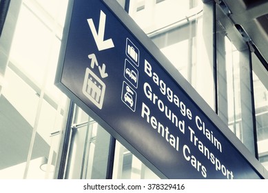 Close Up Of An Airport Exit Sign