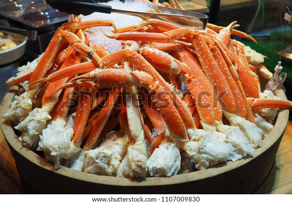 Close up Alaska King Crab legs on ice, Buffet line\
in Japan.