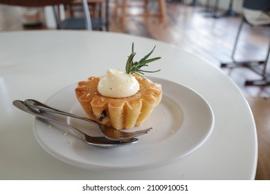 Close Up The Almond Lemon Cake On The White Plate