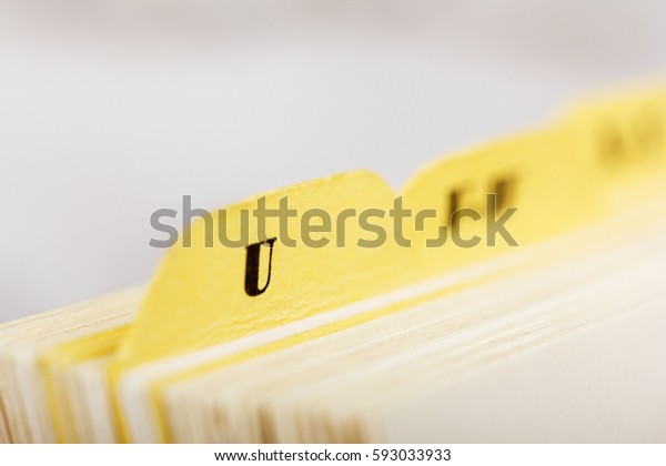 Close up of\
alphabetical index cards in a\
box