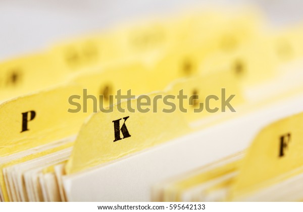 Close up of\
alphabetical index cards in a\
box