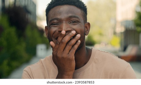 Close up amazed wonder male face African American man biracial shocked guy open mouth shock amazing news surprise face expression astonishment excited say wow in city outdoors win achievement success - Powered by Shutterstock