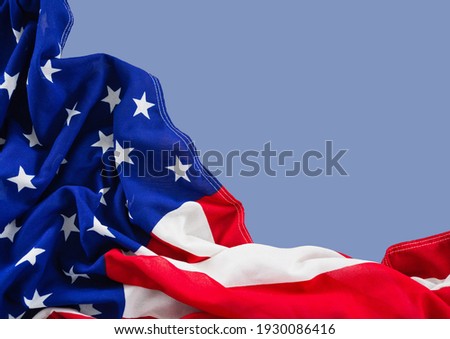 Close up of american flag on light blue background. united states of america patriotism concept digitally generated image.