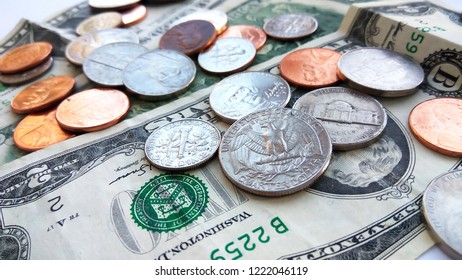 Close Up American Quarter, Dime And Penny Coins On Two Dollars Usa Background