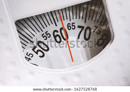 close up analog weight scale