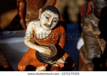 Close up of ancient buddha image or sculpture in Myanmar (Burma), Upagupta, antique and vintage style sculpture