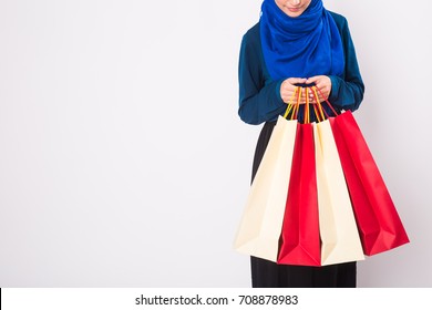 Close Up Of Arab Woman With Shopping Bags