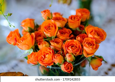 close up arrangement of orange roses