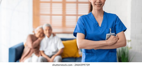 Close up of Asian beautiful caregiver take care senior couple in house. Attractive specialist carer women support elderly older mature grandparent at nursing home care and smiling, looking at camera. - Powered by Shutterstock