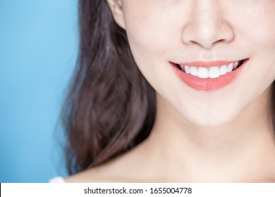 Close Up Of Asian Beauty Woman Has Healthy Teeth And Smile To You