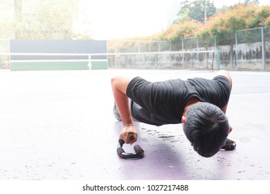 Close Up Asian Man Exercise With Push Up On Outdoor Background