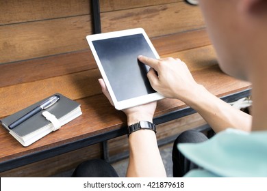 close up Asian man using tablet, laptop and cellphone connecting wifi - Shutterstock ID 421879618