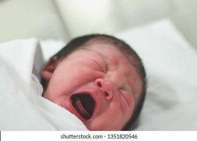 Close Up Of Asian Newborn Baby In A Hospital