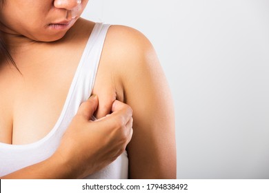 Close Up Of Asian Woman Pulling Excess Fat On Her Skin Underarm She Problem Armpit Fat Underarm Wrinkled Skin, Studio Isolated On White Background, Healthy Overweight Excess Body Concept